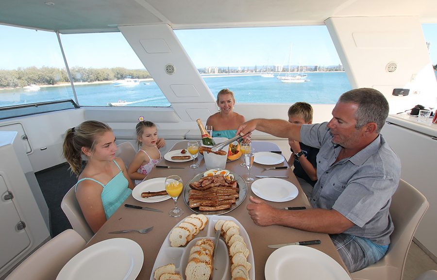 Family dinner on a budget friendly houseboat holiday