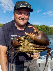 Ben White with a top quality big rusty Mud Crab he scored on a recent trip on the Gold Coast