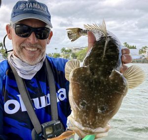 Clint from Brad Smith Fishing Charters with a nice Flathead from the Broadwater