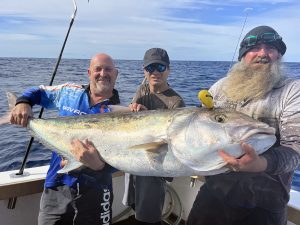 Sea Probe Fishing Charters crew with a monster Amber Jack taken off the Gold Coast