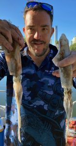 Damo with some nice Arrow Squid caught in the Broadwater with Clint from Brad Smith Fishing Charters