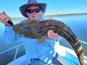 Kerry caught and released this cracking 86cm Flathead with Brad Smith Fishing Charters on the Tweed River