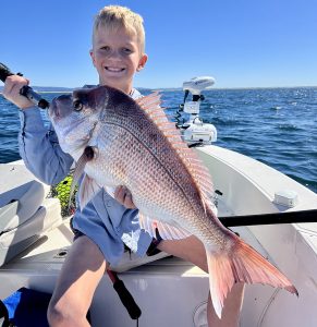 Tyler was all smiles after landing his new PB 70cm Snapper last weekend off the Gold Coast