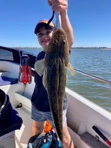 Mitch was happy to catch this nice Flathead Clint from Gold Coast River Charters on the Broadwater