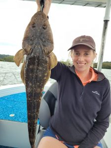 Caitlin from inland Victoria caught her first ever Flathead on the Tweed River with Brad Smith Fishing Charters