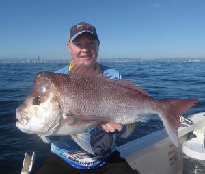 Photo of Brett nailing a great sized Snapper off the Gold Coast